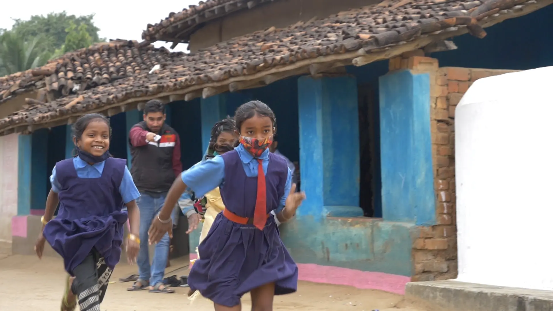 rural-india-girls-running-playing-min